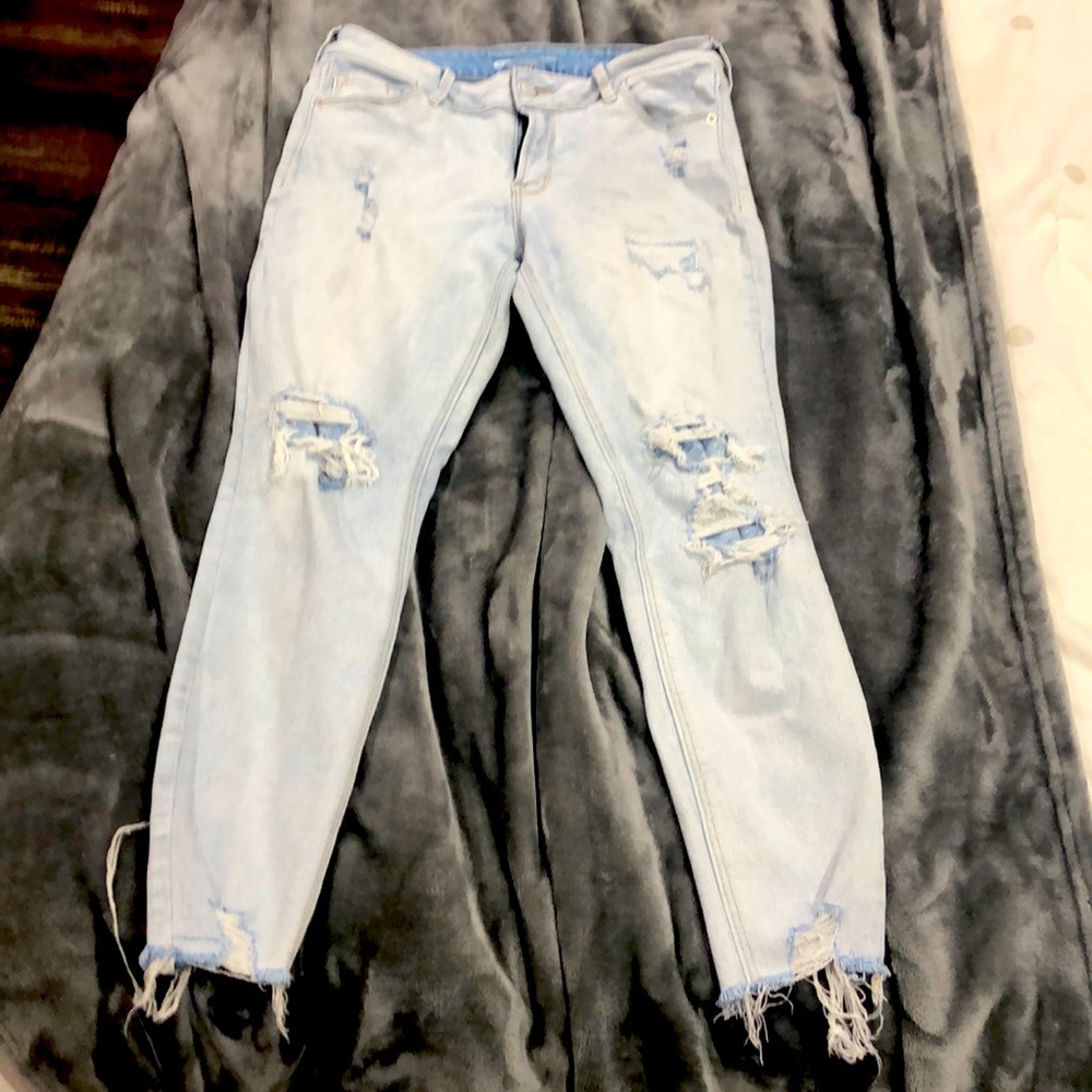 whit washed jeans. with patched holes